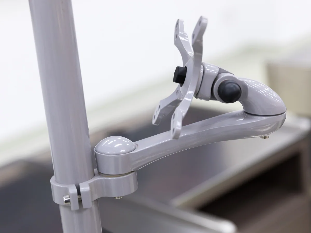 Aluminium border and moulded corner cap on a Keshun cashier counter worktop