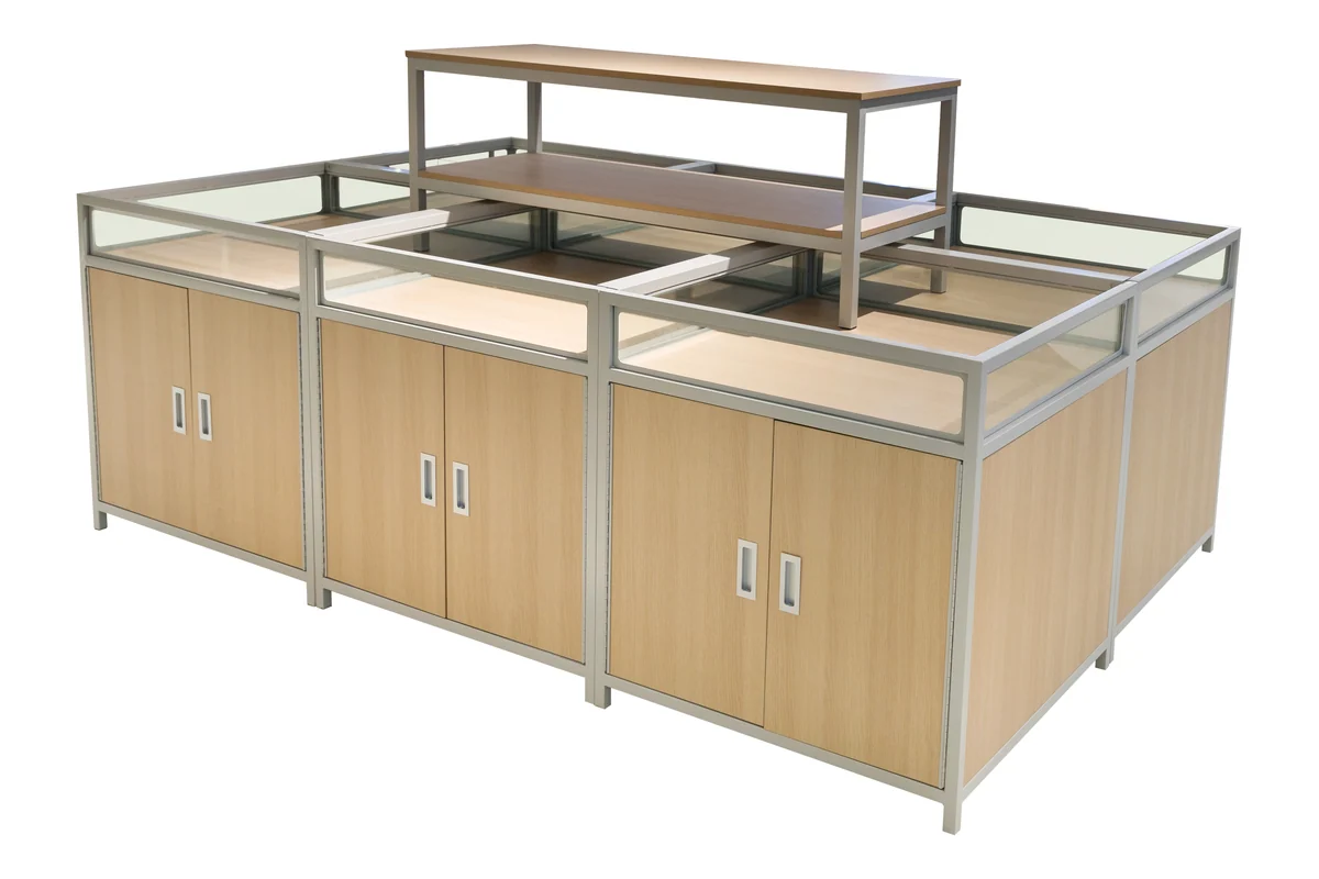 Aluminium framed supermarket promotion island with a glass top over light timber base cabinets