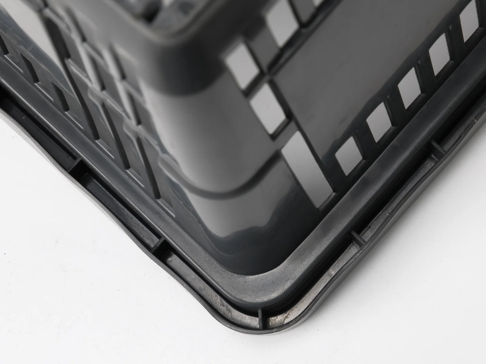 Black Hand Basket with Twin Handles photographed on a white studio background