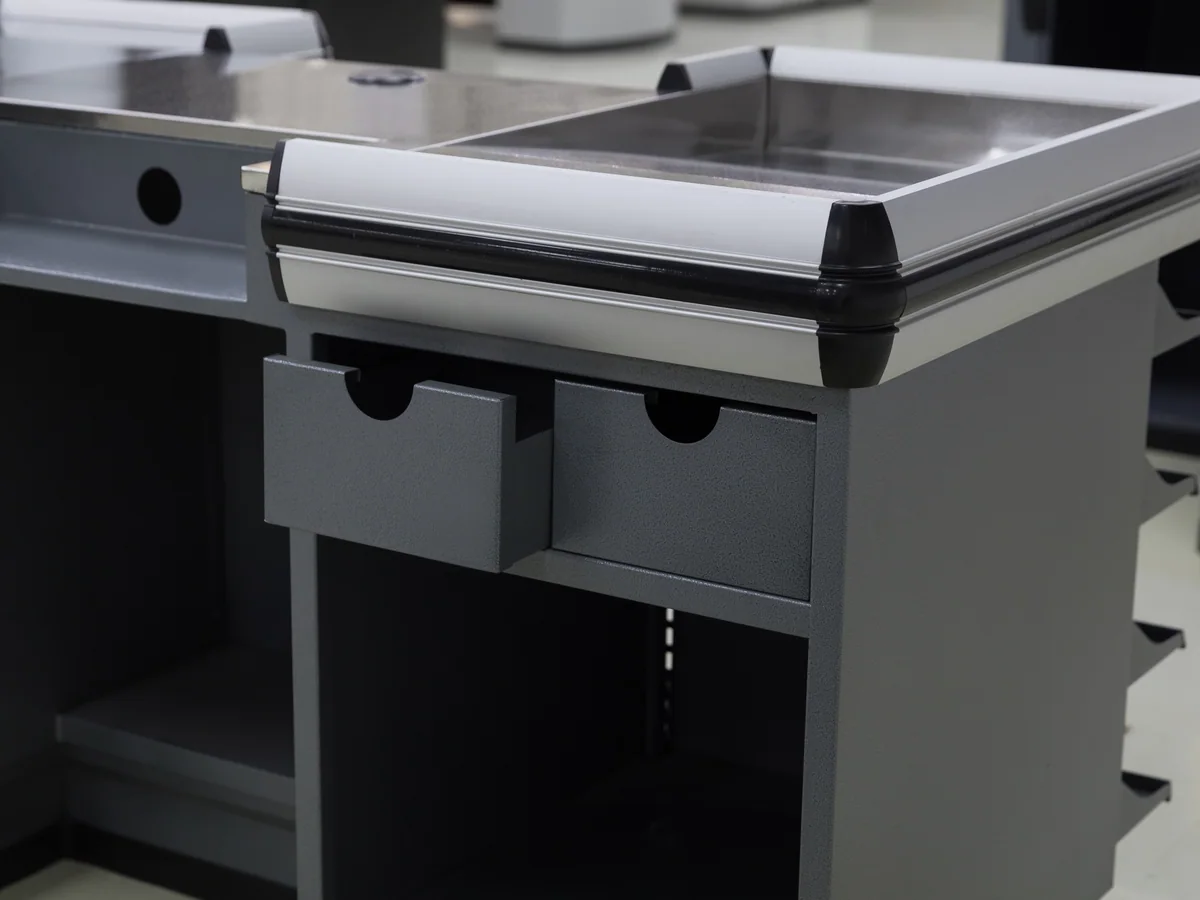 Close-up of the angled tiers on the queue side of the counter