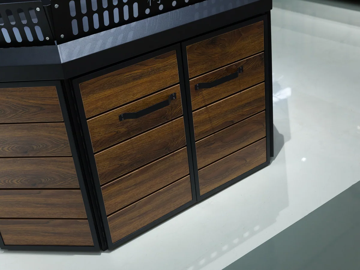Close-up of the black plastic crates edging the produce island deck