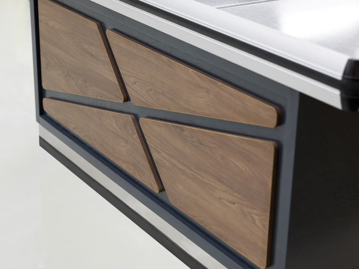 Close-up of the centre of the X brace where the two diagonals cross on the timber panel