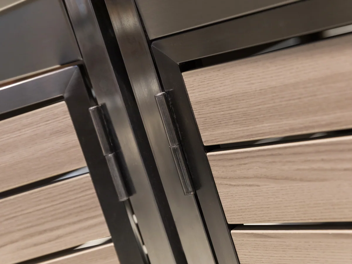 Close-up of the crate-slat timber panel on the island body