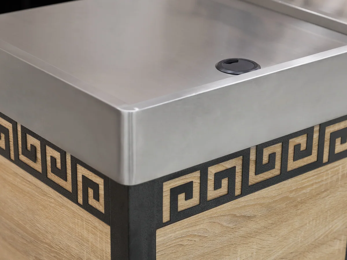 Close-up of the dark inset panel breaking the run of light oak
