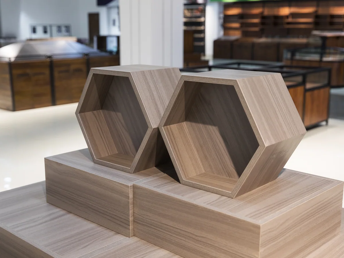 Close-up of the dark timber board on the stand