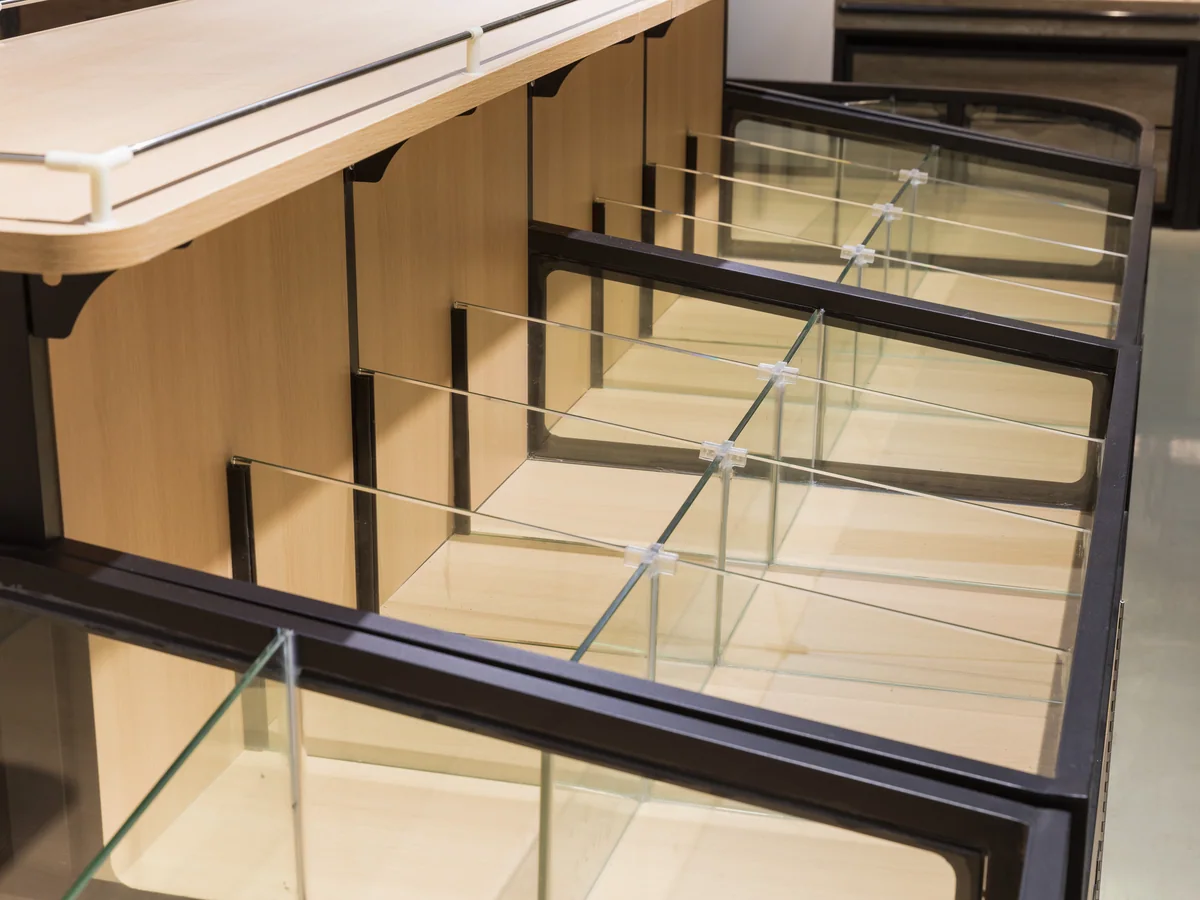 Close-up of the joint between two glass panels in the frame
