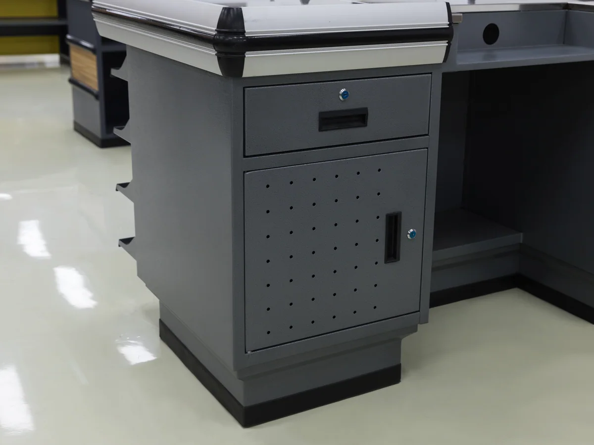 Close-up of the pressed stainless worktop above the tiered display