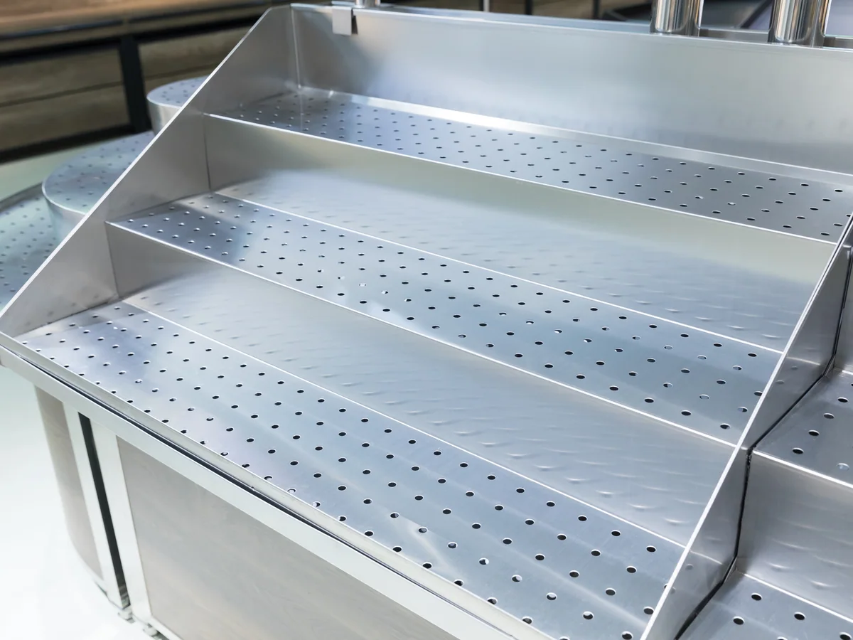 Close-up of the timber base beneath the stainless deck