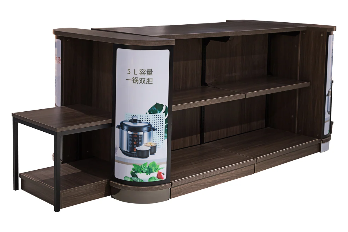Dark timber supermarket shelving run with an end promotion panel and a low display step