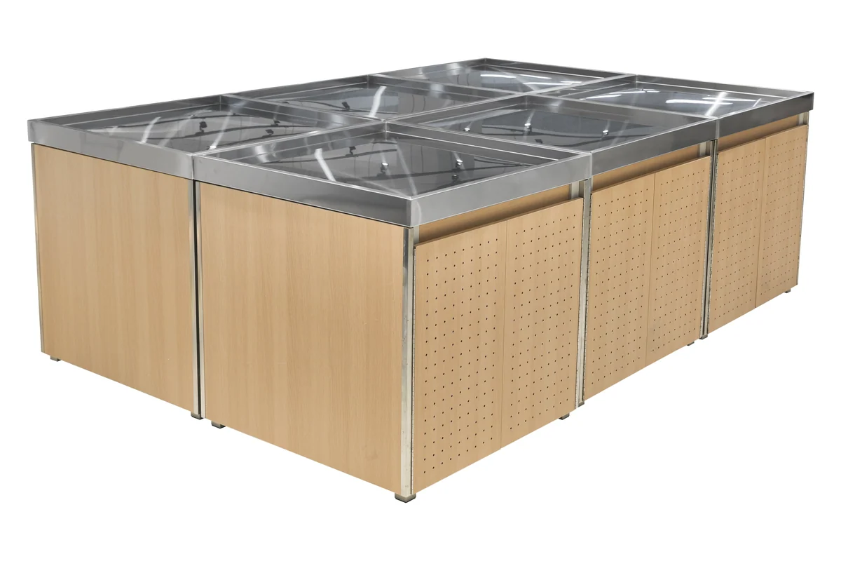 Pressed multi-well stainless steel display deck on a Keshun supermarket produce island