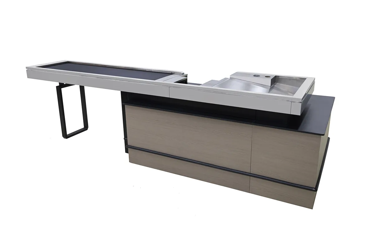Slim supermarket cashier desk counter on a steel leg frame with a stainless packing shelf