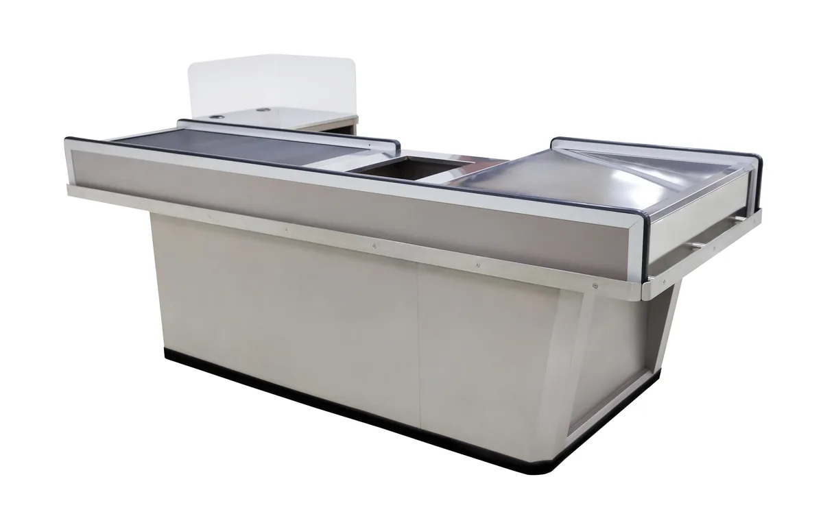 Supermarket checkout counter with a conveyor belt, stainless worktop and packing end