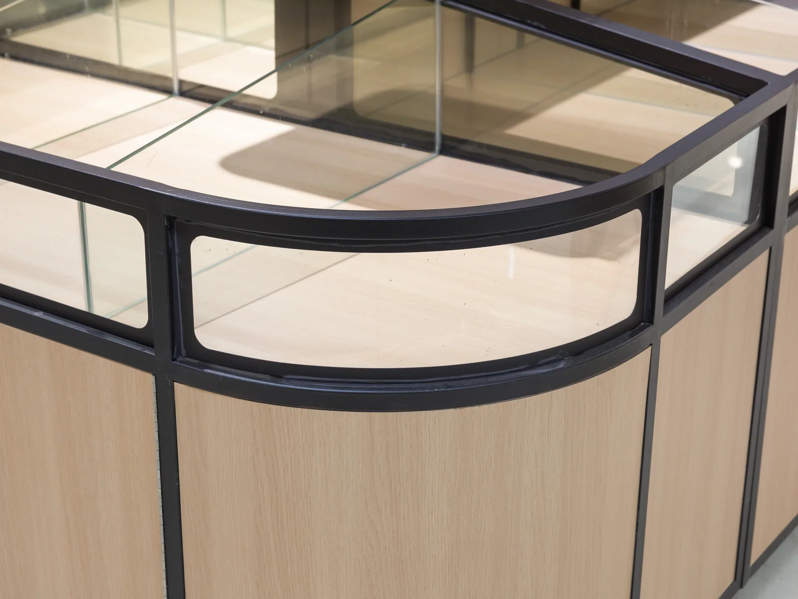 Twin bay glazed bulk island photographed along its length, showing both bays and the pale worktop
