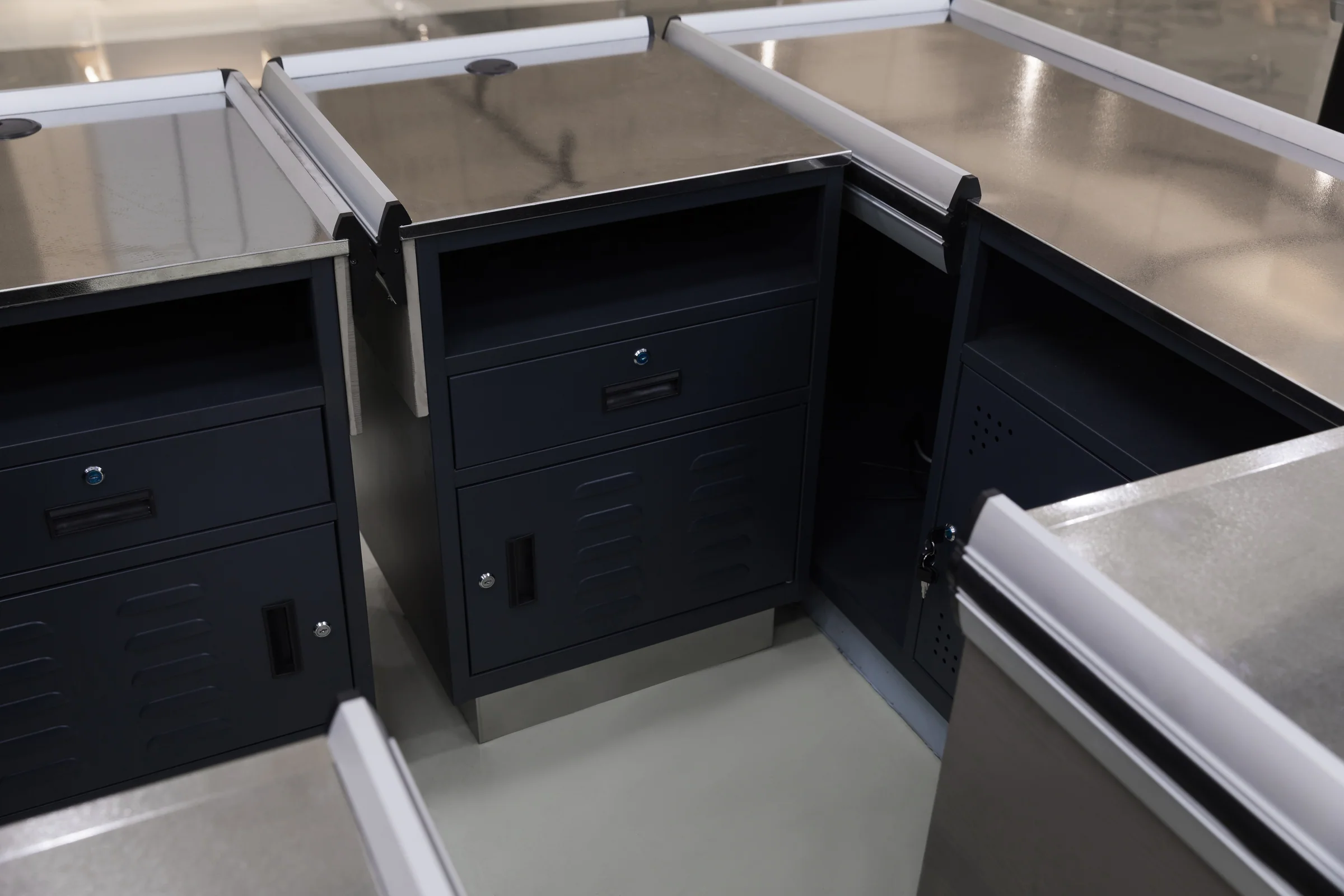Keshun twin position supermarket cashier counter in charcoal and tan timber with two stainless tops