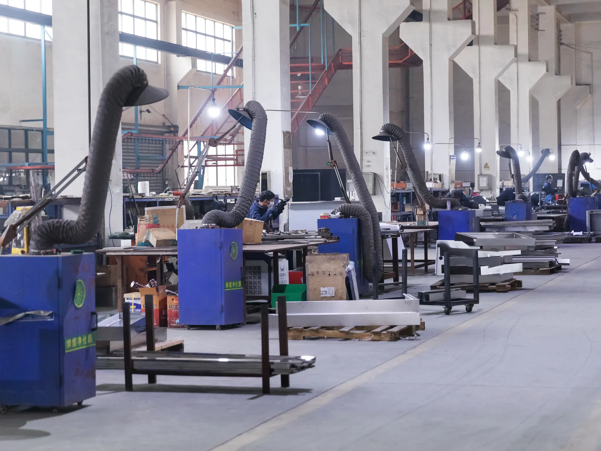 Welding and fabrication stations on the Keshun shop floor in Changshu